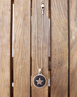 My studio star pendant - silver & black