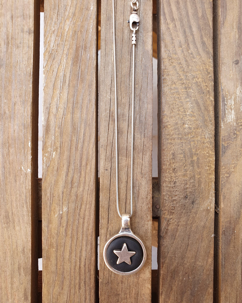 My studio star pendant - silver & black